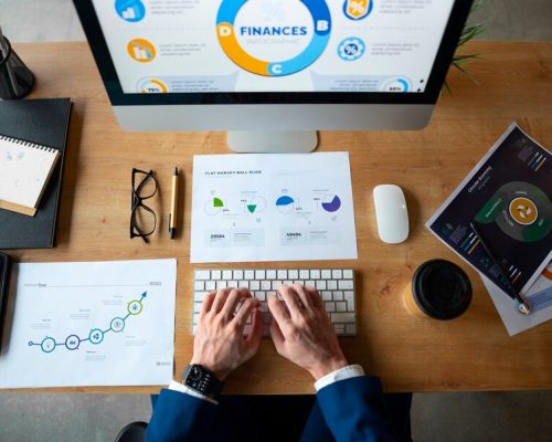 person-office-analyzing-checking-finance-graphs_23-2150377134